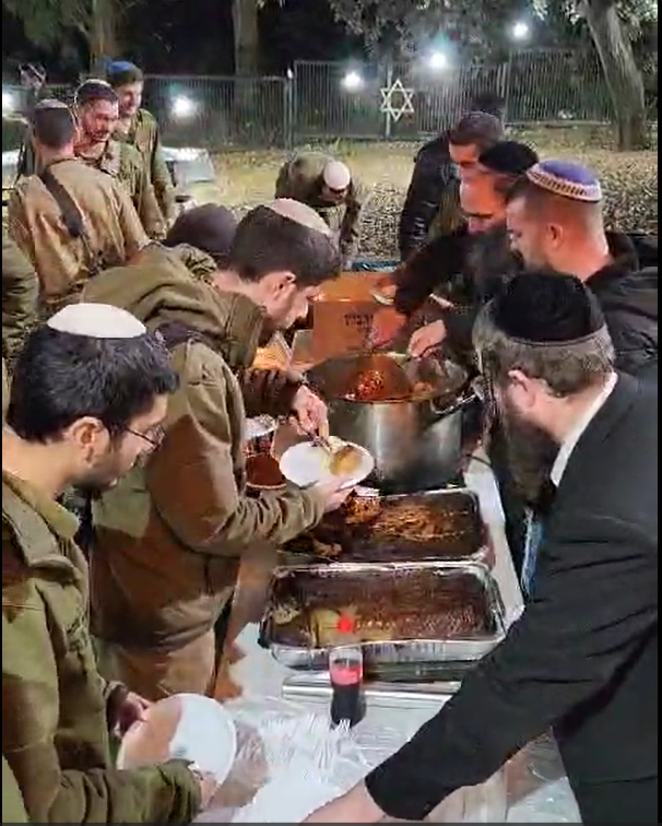 A hot meal being served to soldiers