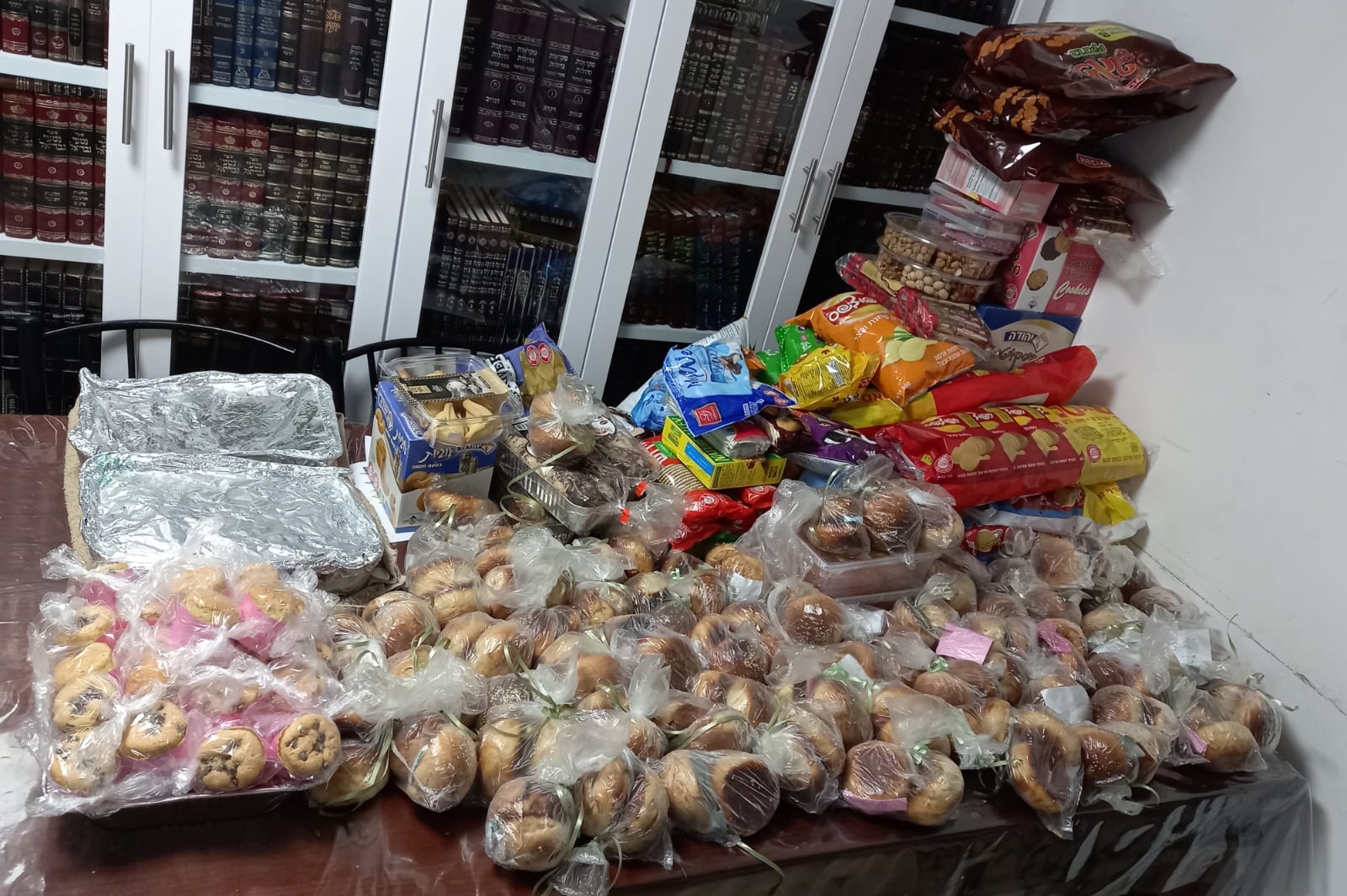 Challos, snacks and covered trays prepared for soldiers